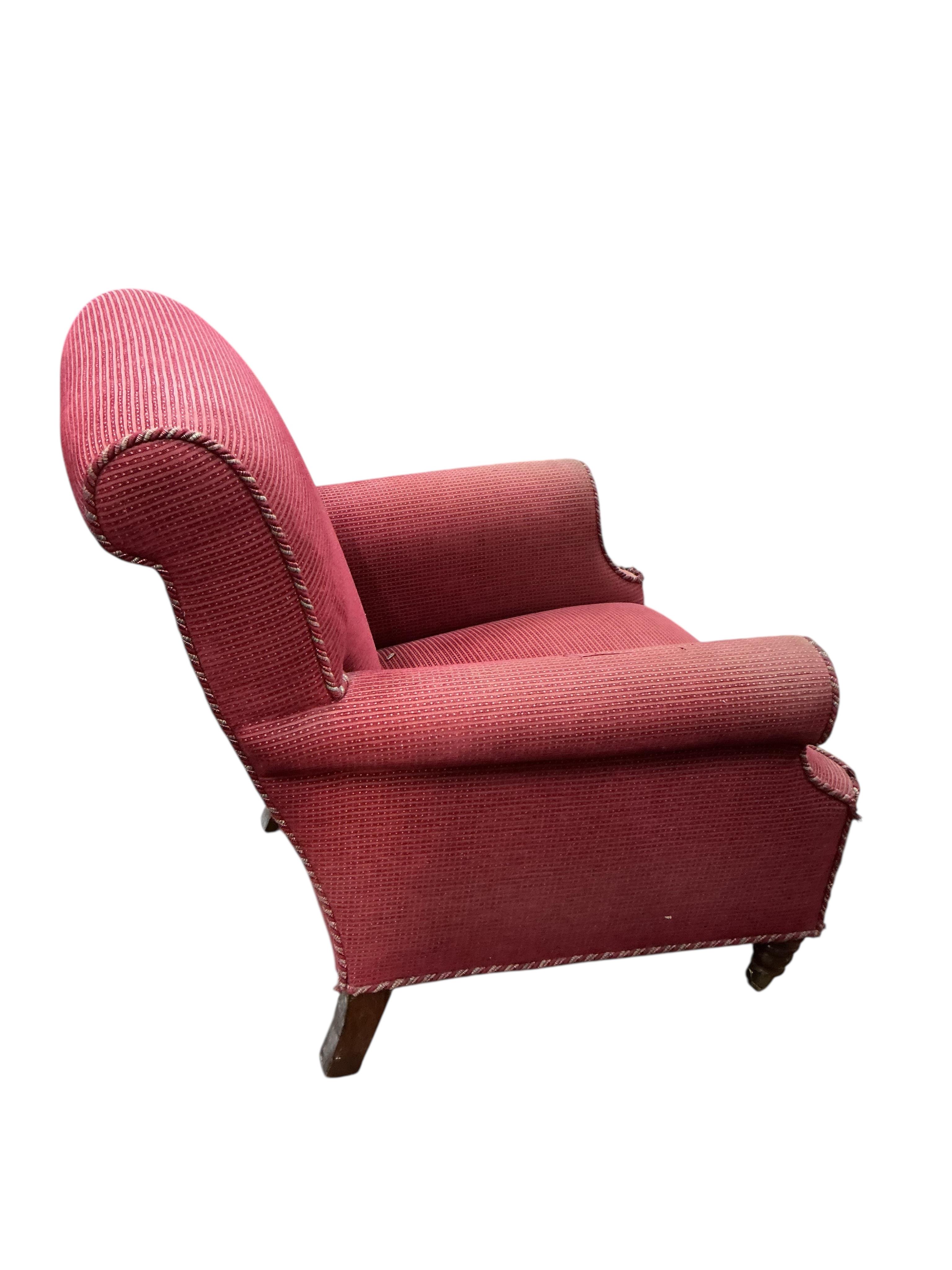 A Victorian style upholstered armchair, width 78cm, depth 76cm, height 90cm